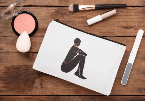 mockup of a cosmetic pouch lying on a wooden surface 29991 1 Designs with a unique blend of culture and style. Rasta vibes, Afro futuristic, heritage and Roots & Culture. GODDESS