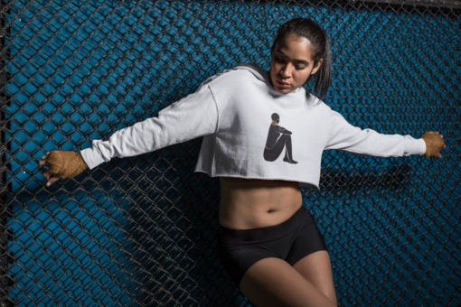 mockup of an mma female fighter wearing a crop top hoodie 26261 Designs with a unique blend of culture and style. Rasta vibes, Afro futuristic, heritage and Roots & Culture. warrior
