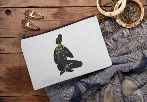 sublimated pouch mockup surrounded by hair pins and bracelets 29990 1 Designs with a unique blend of culture and style. Rasta vibes, Afro futuristic, heritage and Roots & Culture. GODDESS