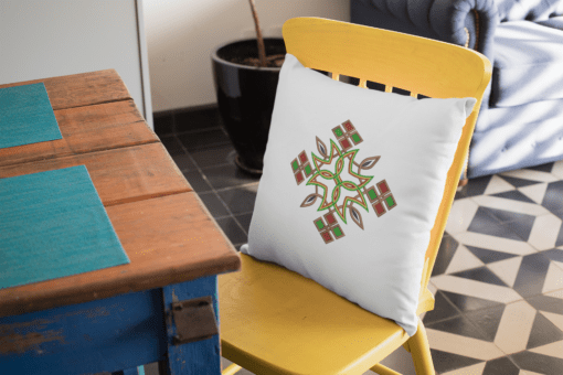 mockup of a square pillow placed on a yellow chair 23561 Designs with a unique blend of culture and style. Rasta vibes, Afro futuristic, heritage and Roots & Culture. ethiopian
